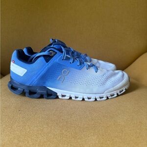 On Running Blue and White Athletic Shoes with Gradient Design